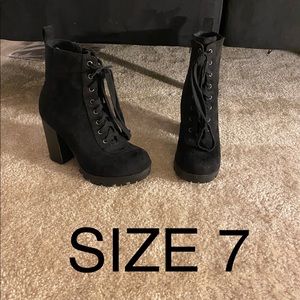 Combat laced heel booties